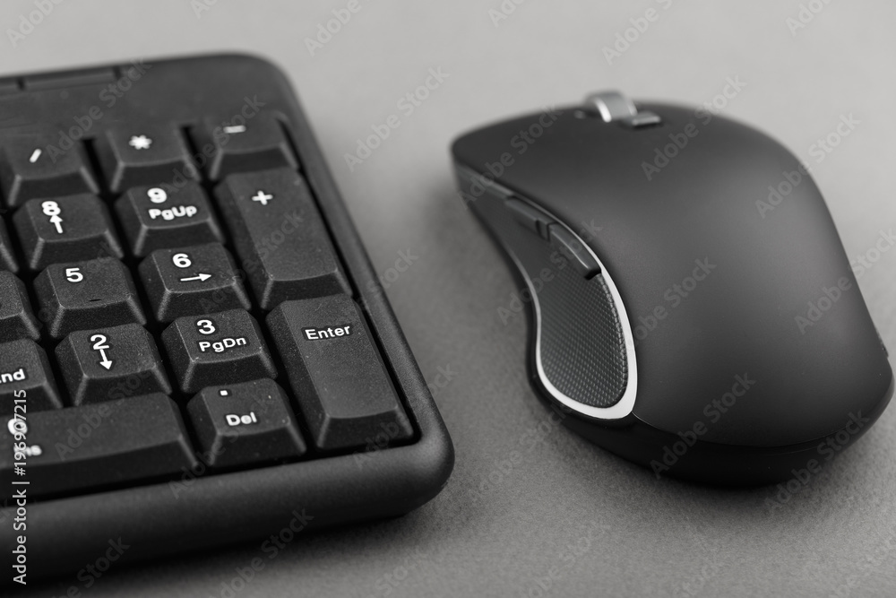 computer mouse near the keyboard computer mouse near the keyboard