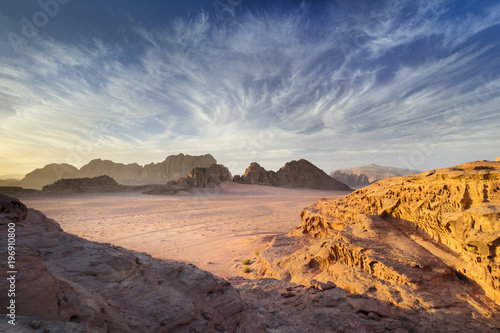Sunset time with beautiful light and sky in desert Wadi Rum in Jordan © sergejson