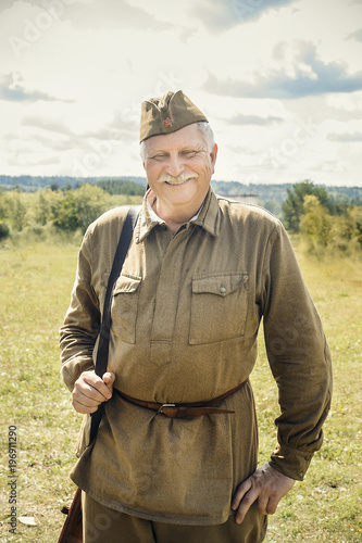Soviet soldier in uniform of the World war 2 period, historical reenactment