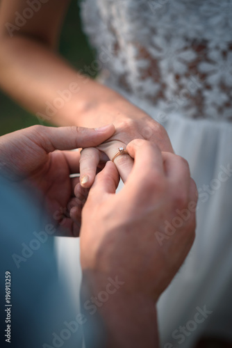 Signs of engagement  ring and flowers