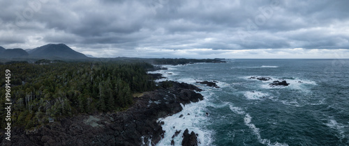 Aerial panoramic seascape view of a rocky Pacifc Coast during a gloomy winter sunset. Taken near Ucluelet, Vancouver Island, British Columbia, Canada. © edb3_16