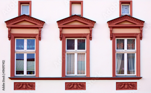 Ornaments and windows on a historic house from 1888 in Greifswald, Germany