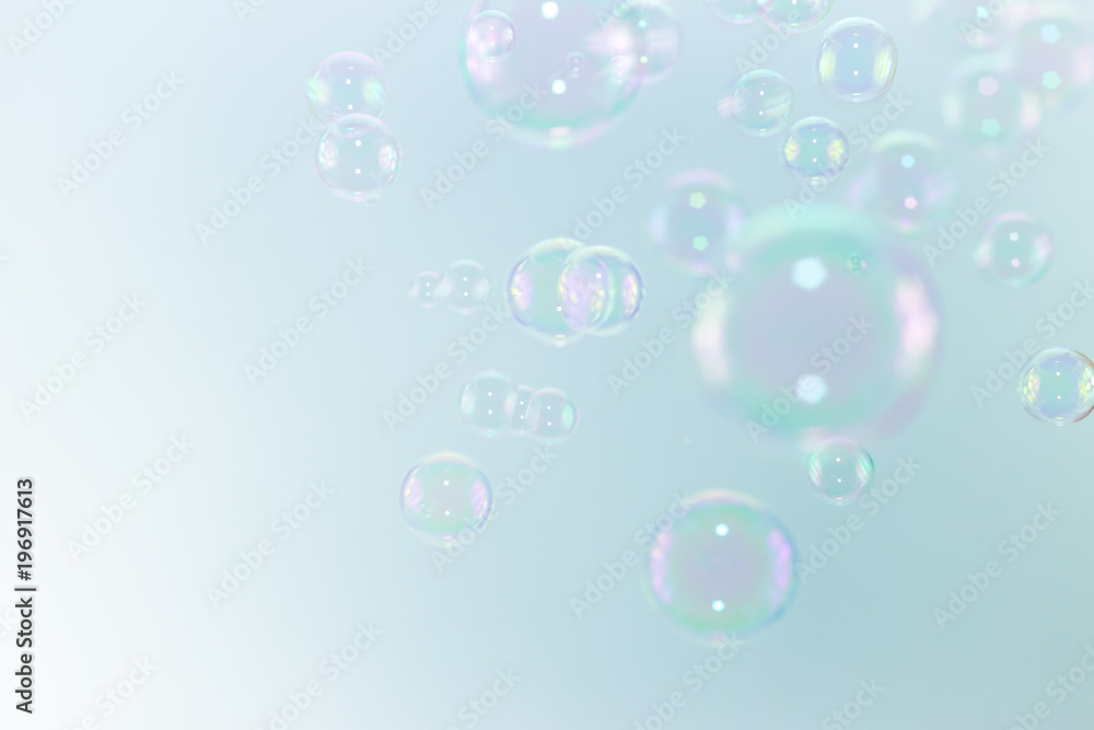 Abstract beautiful color soap bubbles float in the air.