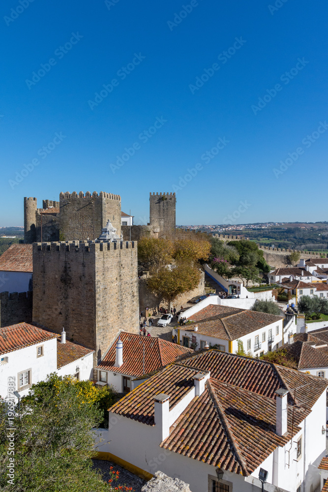 Obidos, Portugal. December 2, 2017. Urban scene of the small town of Obidos, in the interior of Portugal. Obidos, Portugal. December 2, 2017. Urban scene of the small town of Obidos, in the interior of Portugal.