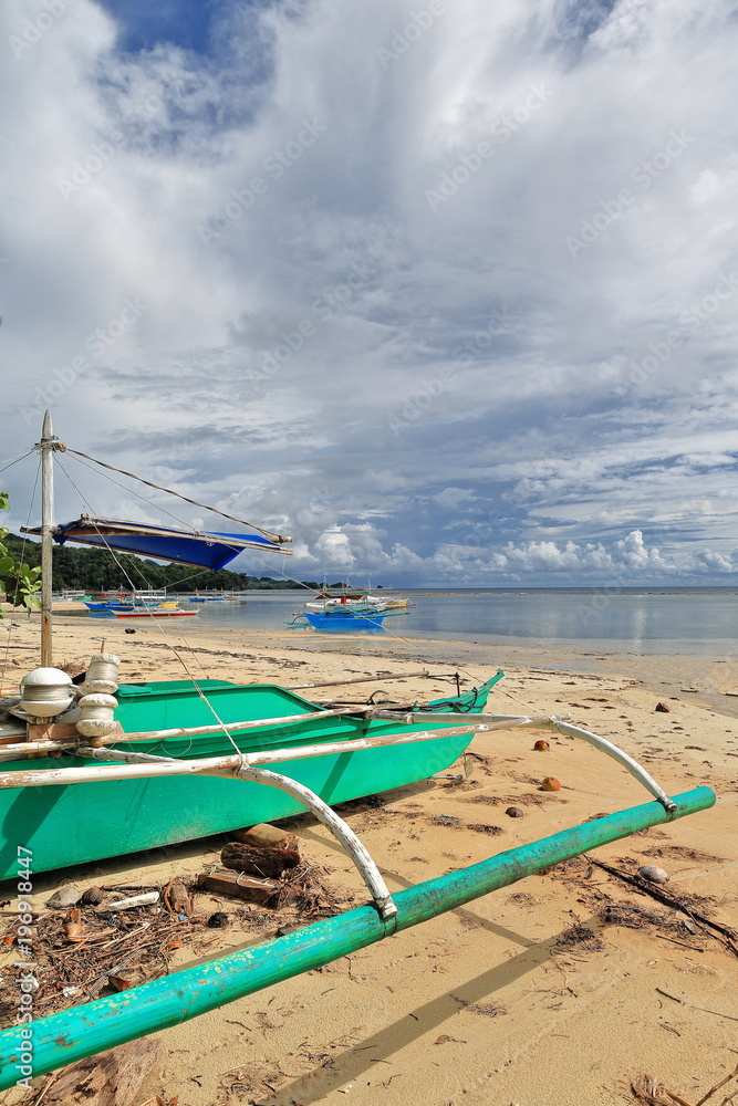 Balangay or bangka boats ashore. Punta Ballo beach-Sipalay-Philippines. 0304