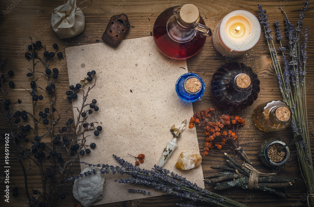Magic potion ancient recipe scroll with copy space. Alternative herbal medicine. Shaman table with copy space. Druidism concept. Witch doctor desk background. Magic potion ancient recipe scroll with copy space. Alternative herbal medicine. Shaman table with copy space. Druidism concept. Witch doctor desk background.
