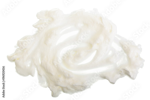 whipped cream or meringue isolated on white background. Top view. Flat lay © kolesnikovserg