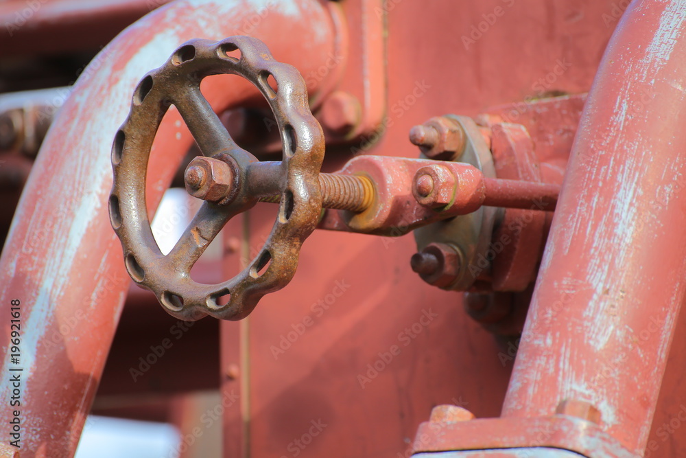 Valve of a historical red steam engine Valve of a historical red steam engine