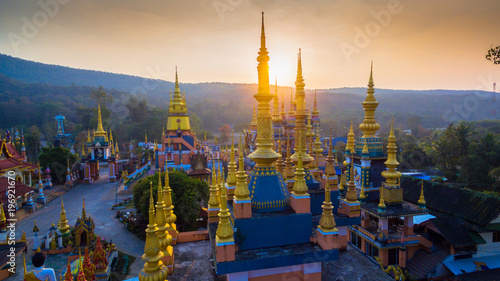 aerial photography sunrise at wat Huay Shrykhao hindu architecture in Chiang Rai Thailand photo