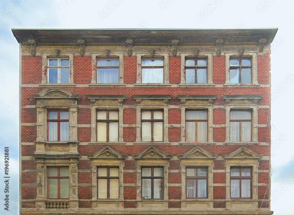 Fototapeta premium Desolate facade of a house listed as monument in Magdeburg