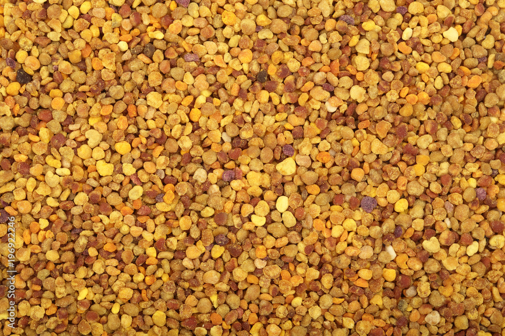 fresh bee pollen as a background. Top view. Flat lay fresh bee pollen as a background. Top view. Flat lay