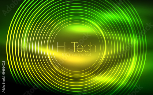 Circular glowing neon shapes, techno background. Abstract shiny transparent circles on dark technology space