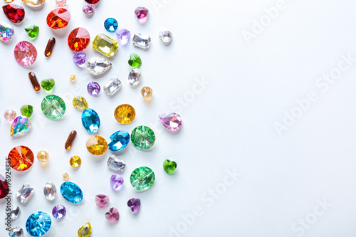 Vászonkép Colorful precious stones for jewellery on white background