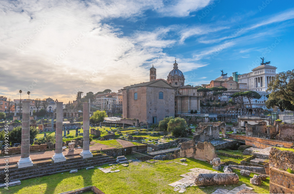 Rome, Italy  - The archeological ruins in historic center of Rome, named Imperial Fora.