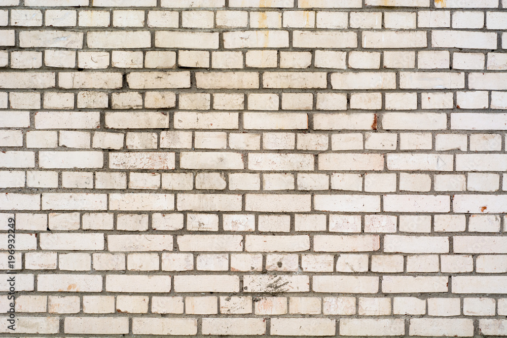Background of the damaged old brick wall with horizontal masonry Background of the damaged old brick wall with horizontal masonry