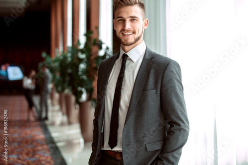 Portrait of an handsome businessman in an urban setting.