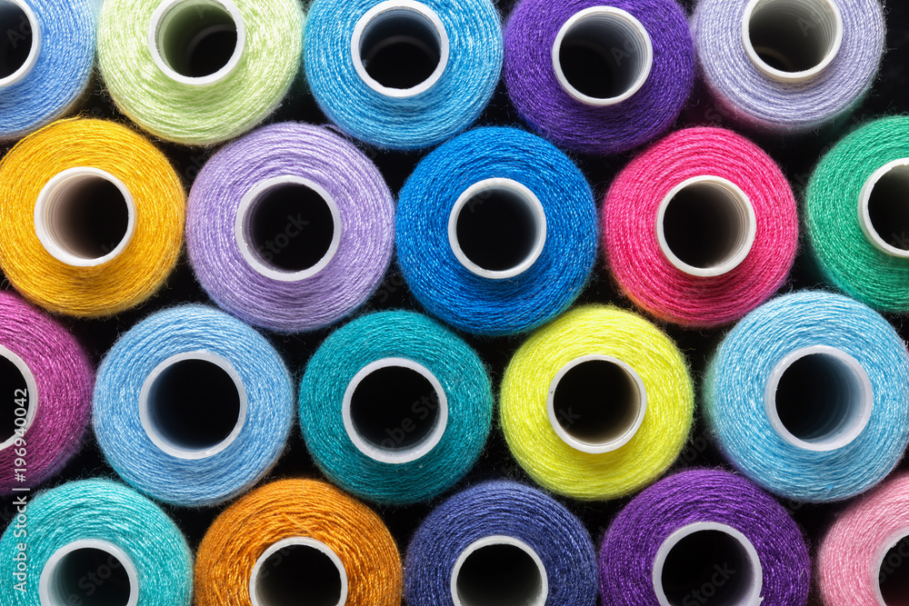 sewing thread in different colors pink blue green red sewing thread in different colors pink blue green red