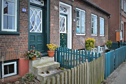 Blankenese, Hamburg, Germany, old brick house with green door