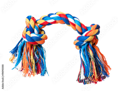Dog toy - colorful cotton rope for games, isolated on white background with copy space