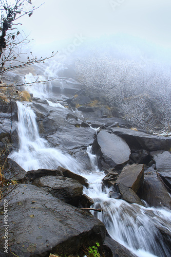 Fotografía Beautiful landscape with waterfall and river flowing in mountains
