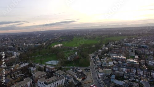 London Suburban Downtown Neighborhood Aerial View feat. Beautiful Sky Flying Over Clapham Park in South London around Sunset Time in Dusk 4K Video Aerial Shot in England UK  photo