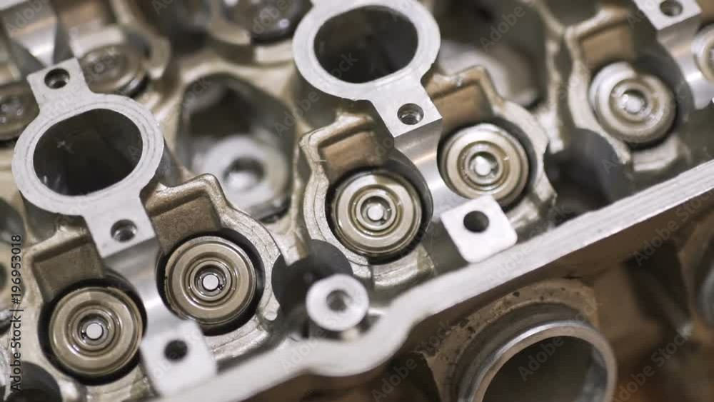 Motor head, valve, cam-shaft, from a motorcycle or car. Close-up shot Motor head, valve, cam-shaft, from a motorcycle or car. Close-up shot