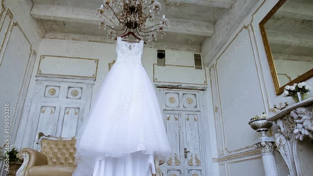 Beautiful white wedding dress for bride indoors Beautiful white wedding dress for bride indoors