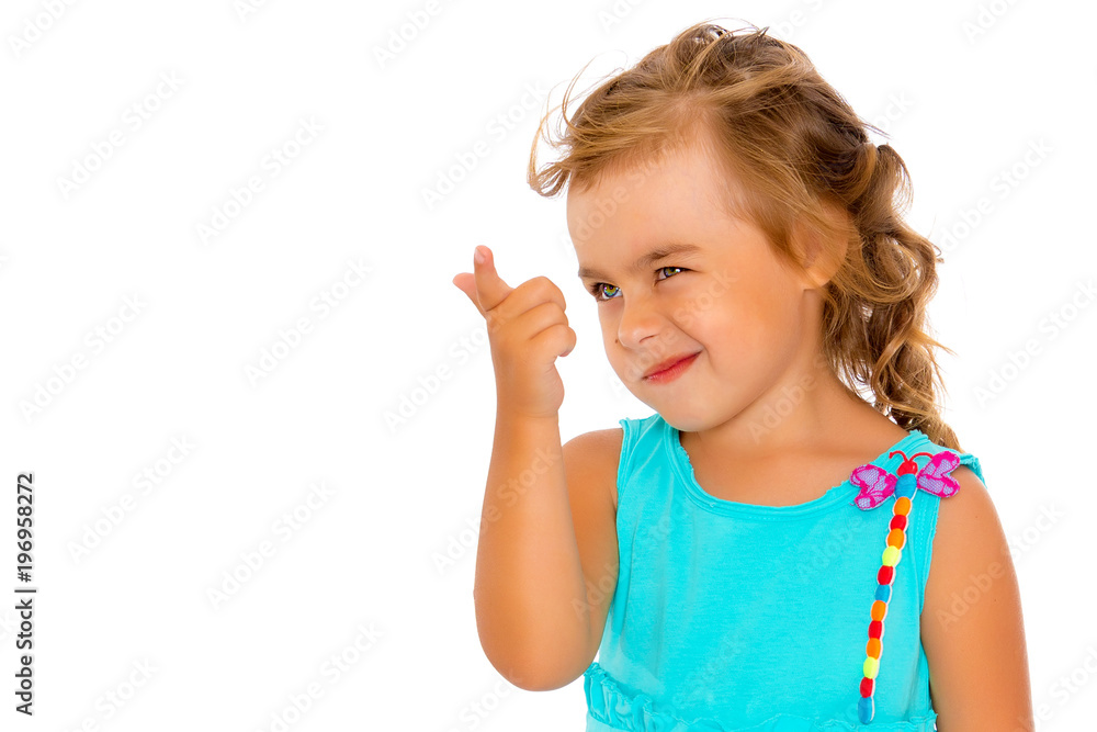 Little girl is showing a finger Little girl is showing a finger
