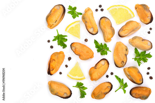 mussels with parsley lemon and peppercorns isolated on white background. Top view. Flat lay
