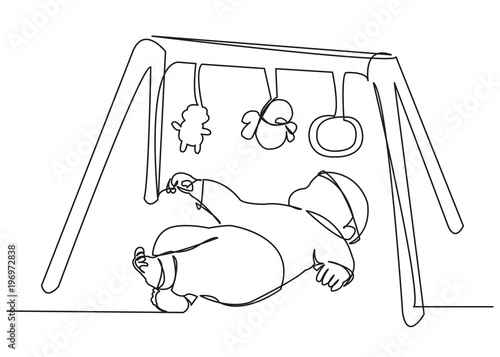 the kid is playing on the game mat