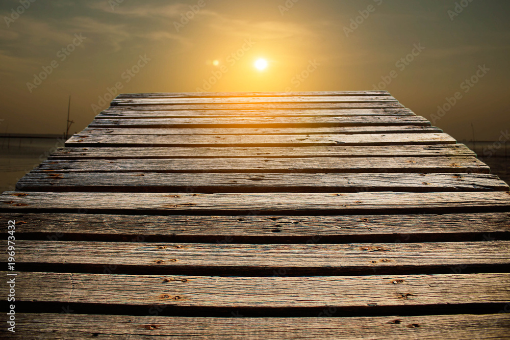 Naklejka premium Old bridge with the sunset.