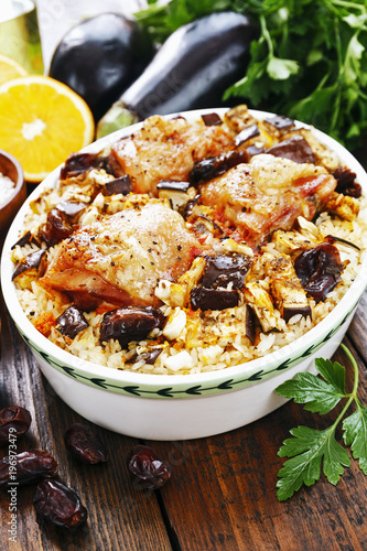 Chicken thigh baked with rice  eggplant and figs