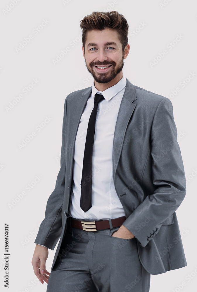 Half length portrait of a businessman with hands in his pockets Half length portrait of a businessman with hands in his pockets
