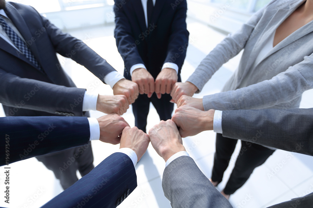 closeup.business people show a circle of hands. closeup.business people show a circle of hands.