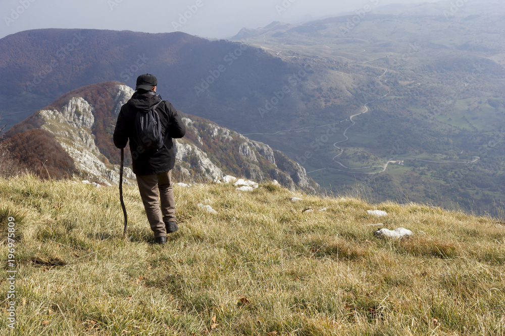 hiker on mountain peak on matese park