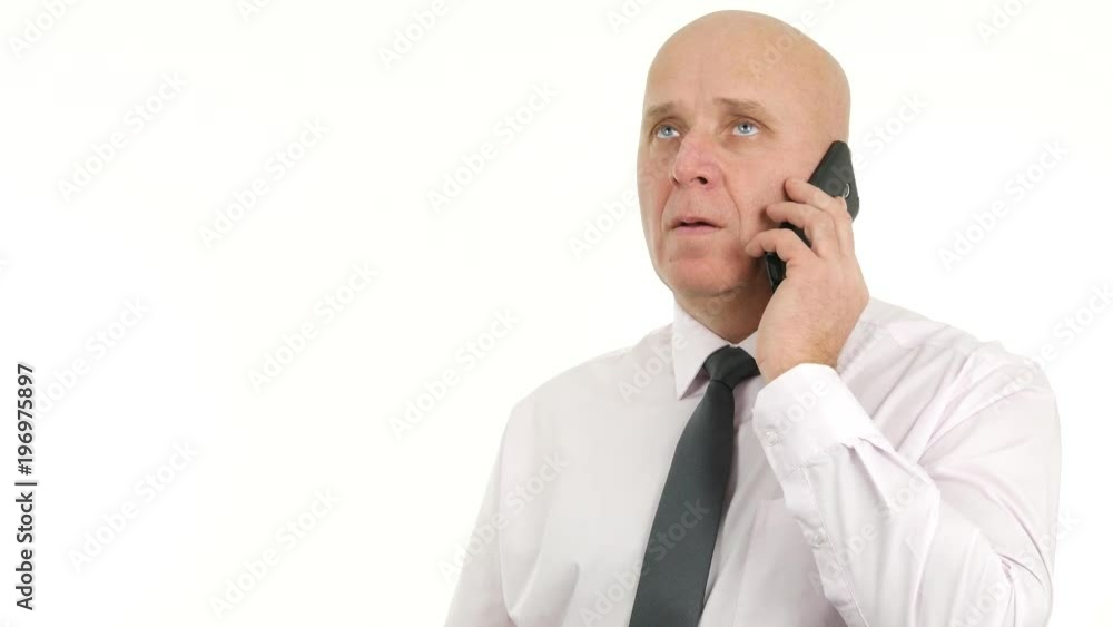 Businessman Using Cellphone Hears Bad News and Make Hand Gestures Disappointed Businessman Using Cellphone Hears Bad News and Make Hand Gestures Disappointed
