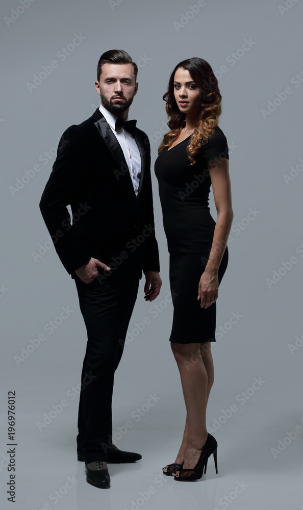 Business partners standing on a gray background Business partners standing on a gray background