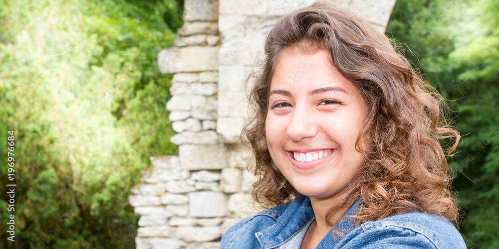 Portrait close up of young beautiful happy teenage girl summer outdoors Portrait close up of young beautiful happy teenage girl summer outdoors
