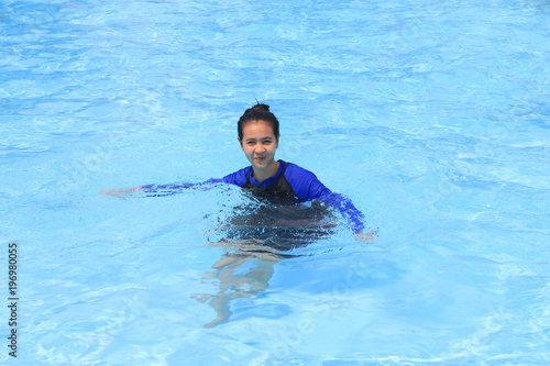 Asian woman swimming pool © i am way