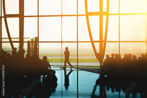 Silhouette image of Hong Kong airport, travelers wainting for airplane photo