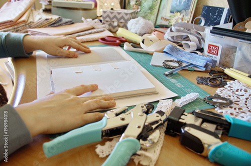 handmade creating of the diary from special scrapbooking paper