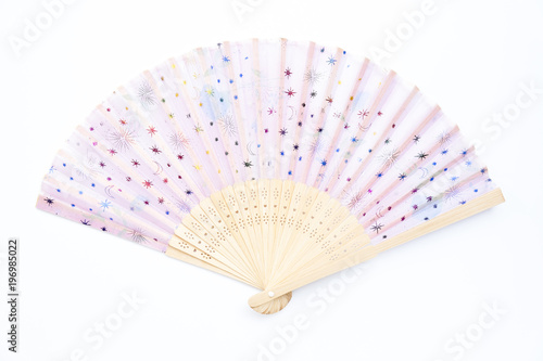 Color painted folding fan on white background.