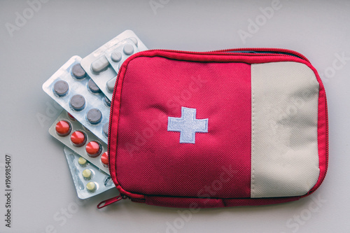 First aid kit with pills for diseases. Medications in a medical bag