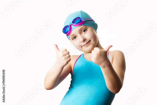 Little caucasian 7 years old swimmer