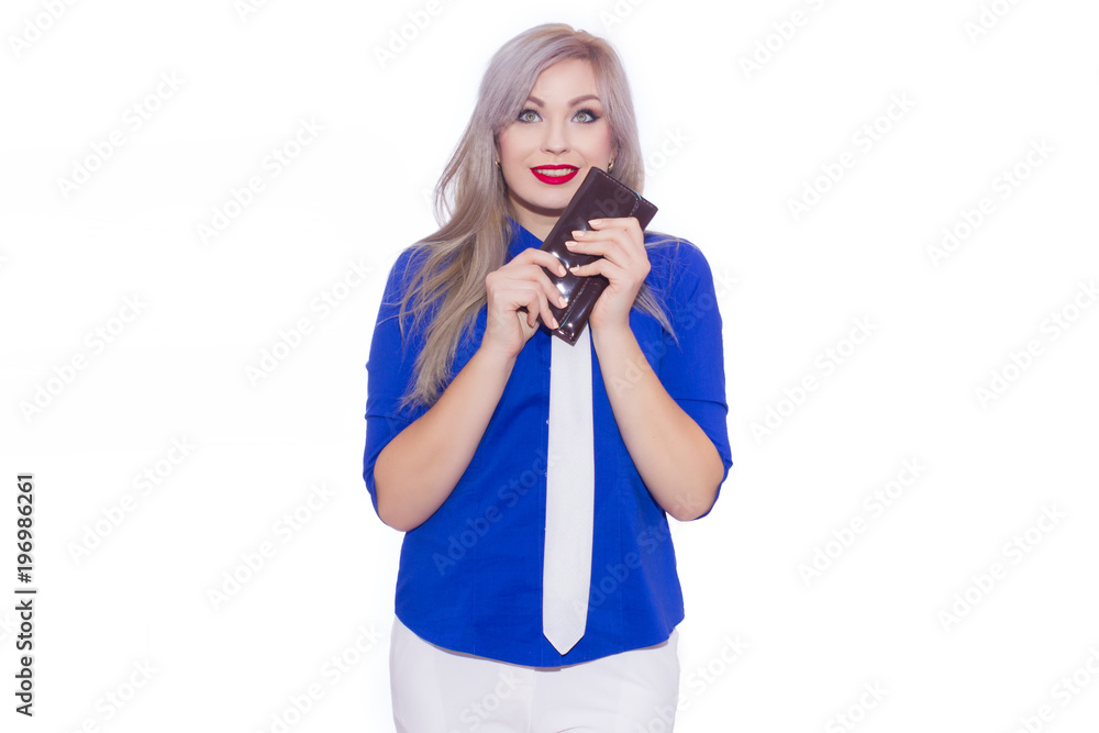 studio isolated portrait of a young blond woman in white trouser suit. The girl is holding a purse. studio isolated portrait of a young blond woman in white trouser suit. The girl is holding a purse.