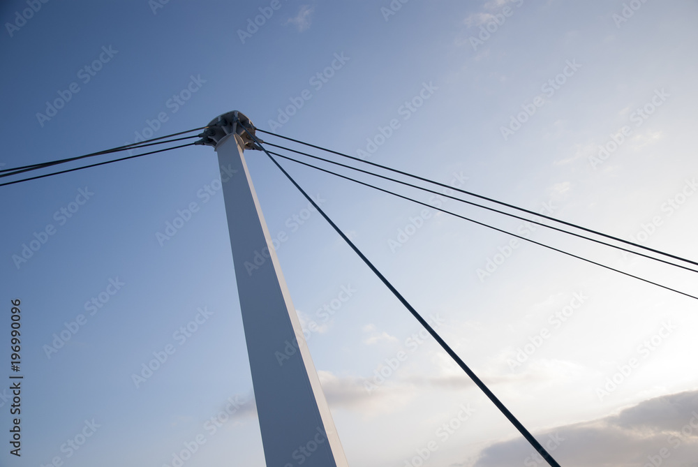 Fototapeta premium Detail of cable-stayed bridge against the blue sky