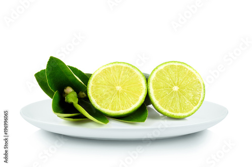 Lemon in white plate on white background