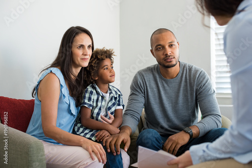 Couple talking to family counselor photo