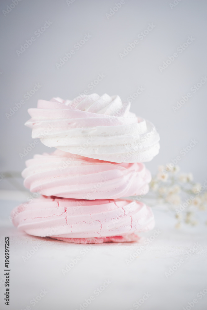 Raspberry meringue on concrete desk. Space for text. Close up view. Romatic wedding. Raspberry meringue on concrete desk. Space for text. Close up view. Romatic wedding.