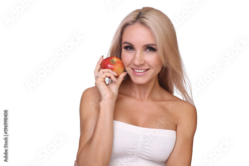 blond woman eat red apple